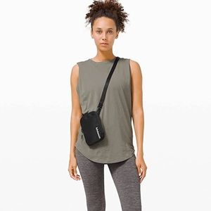 Lululemon Easy Access Black Nylon North South Crossbody Bag.